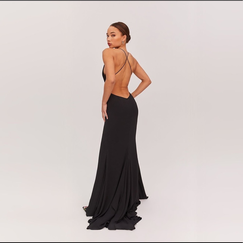 Black backless gown by Fame and Partners